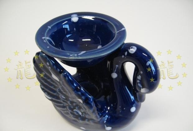 Zwaan oliebrander blauw Zwaan oliebrander blauw