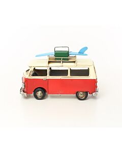 Miniatuurmodel rode bus met surfplank