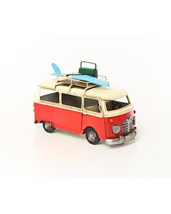 Miniatuurmodel rode bus met surfplank