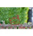 Metalen Kiekeboe roestkleurige Kat Kitty op het hek