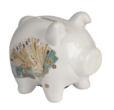 Spaarvarken met euro biljetten Spaarvarken met euro biljetten